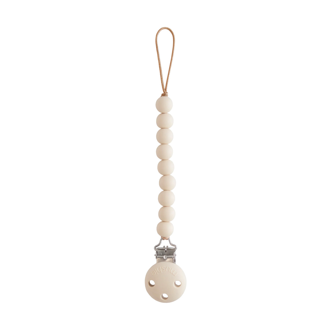 Mushie® držalo za dudo Hera – Shifting Sands